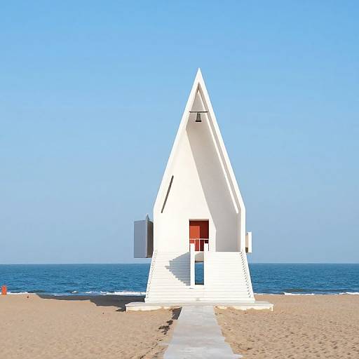 Photorealistic CGI of a white, triangular beach hut with a red door, set on sandy shore with blue ocean and clear sky.