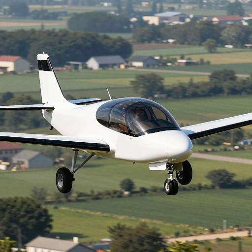 Sleek Electric Aircraft Over Rural Landscape
