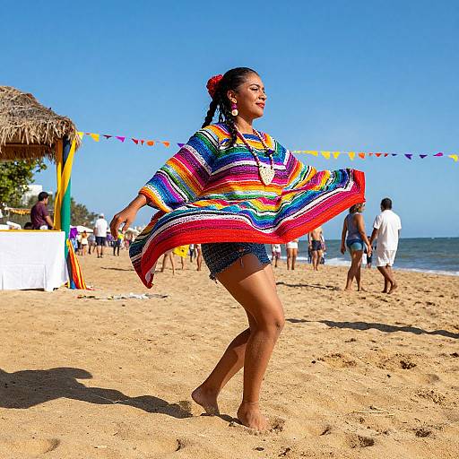 Photograph of a tan-skinned woman with braided hair dancing on a sunny beach, wearing a colorful striped poncho and denim shorts, with festive
