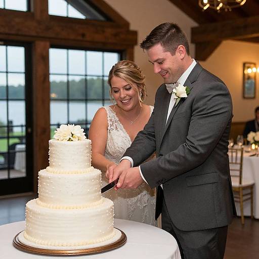 Bride and Groom Cutting Cake