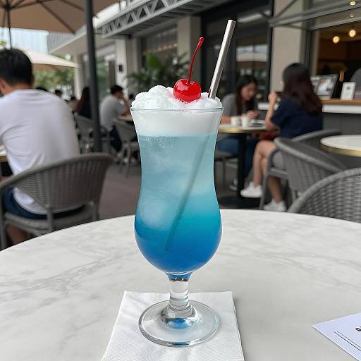 Blue Gradient Cocktail with Cherry