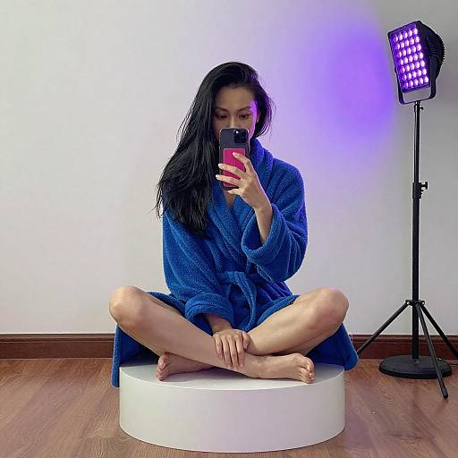 Woman Taking Mirror Selfie on Platform