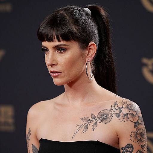 Serious Woman with Floral Tattoos