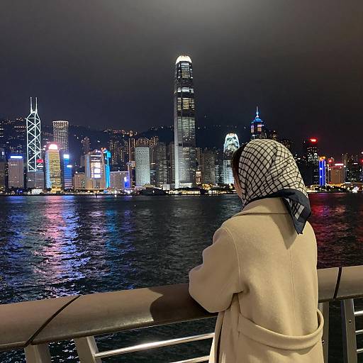 Person Overlooking Hong Kong Night Skyline