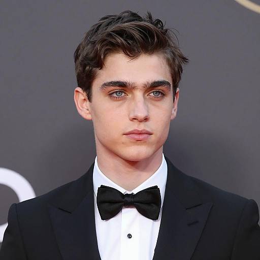 Stylish Young Man in Tuxedo Portrait