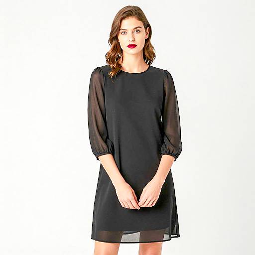 Elegant Young Woman in Black Dress