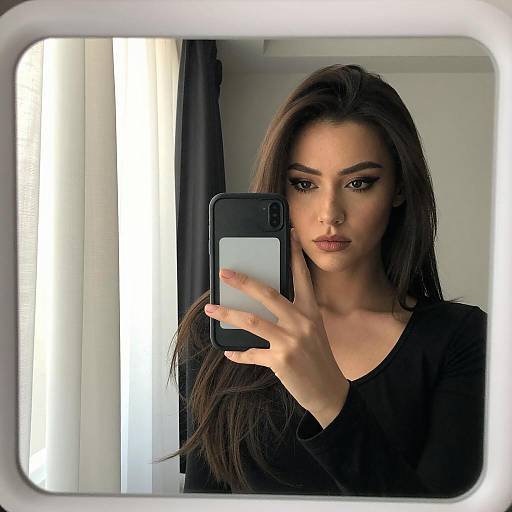 Mirror Selfie of a Stylish Woman