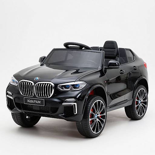 Photograph of a sleek, black BMW Z4 Roadster with shiny chrome grille, LED headlights, and red brake calipers, set against a white