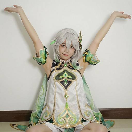 Person in Ornate White and Green Dress