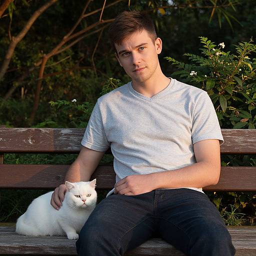 Man with White British Shorthair in Serene Landscape
