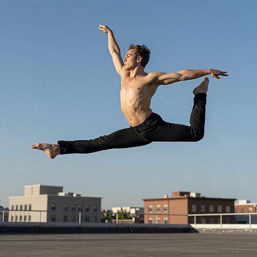 Dynamic Male Dancer in Urban Rooftop Leap