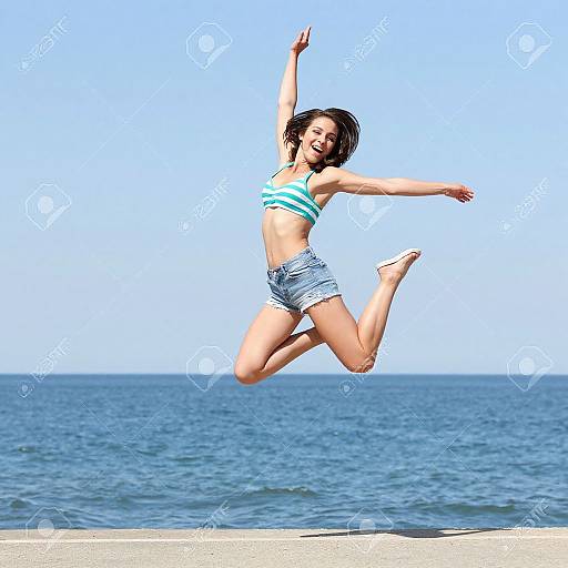 Young Woman Jumping in Summer