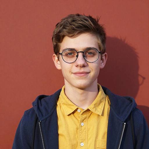 Portrait of Smiling Boy with Glasses