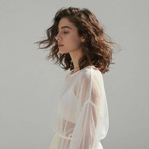 Serene Woman in Sheer White Dress