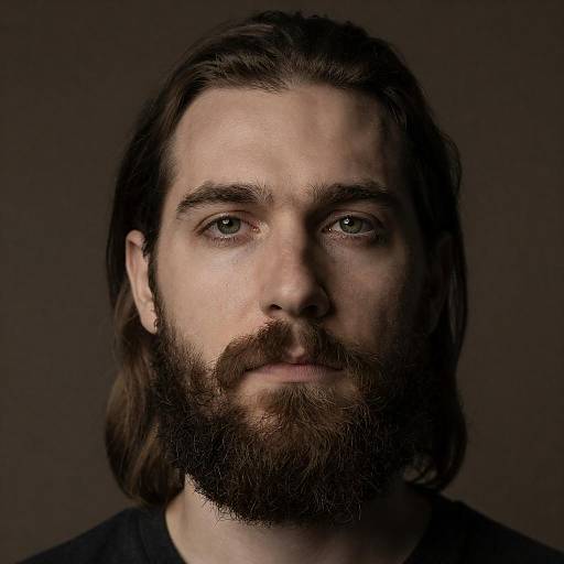 Bearded Man with Long Hair and Green Eyes