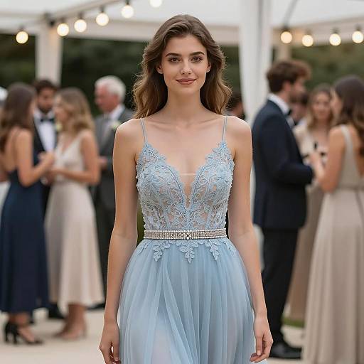 Young Woman in Elegant Light Blue Dress at Outdoor Party