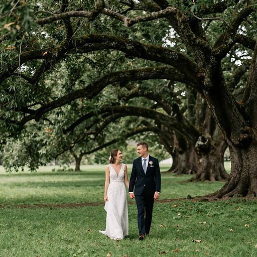 Couple Walking Beneath Ancient Trees