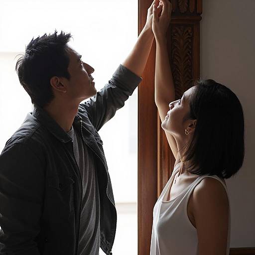 Intimate Moment by the Carved Column