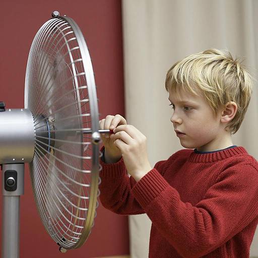 Focused Boy with Oscillating Fan