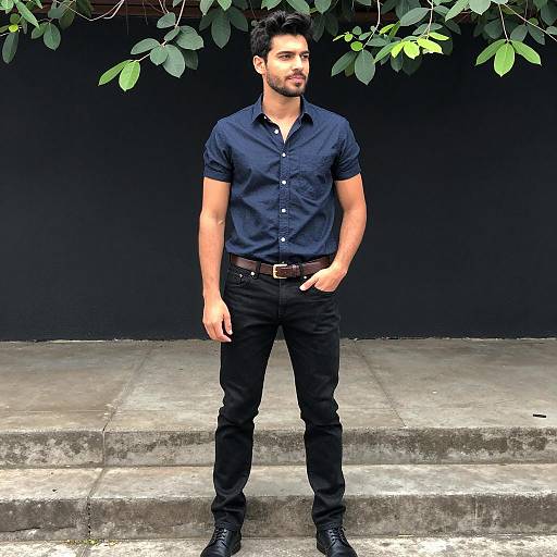 Man in Casual Dark Blue Shirt and Black Jeans