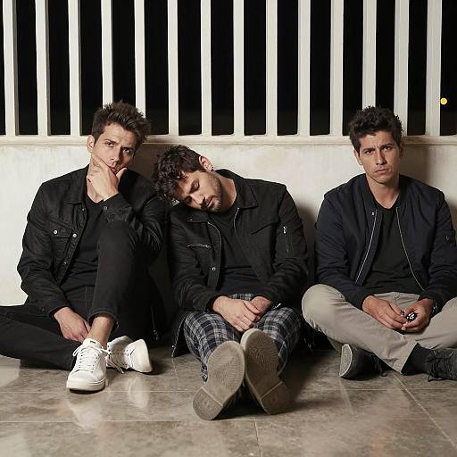 Three Men in Stylish Black Jackets