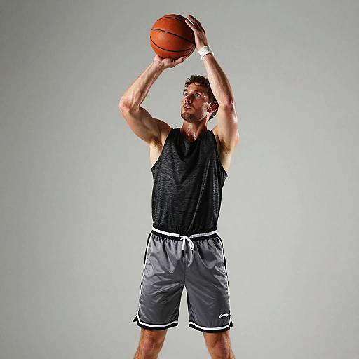 Muscular Man Shooting Basketball