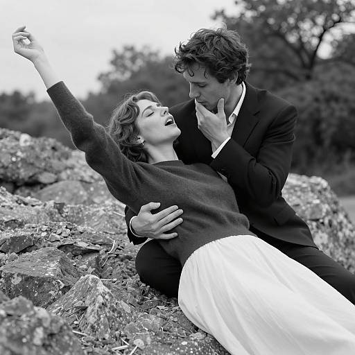 Black and White Portrait of Couple on Rocky Surface