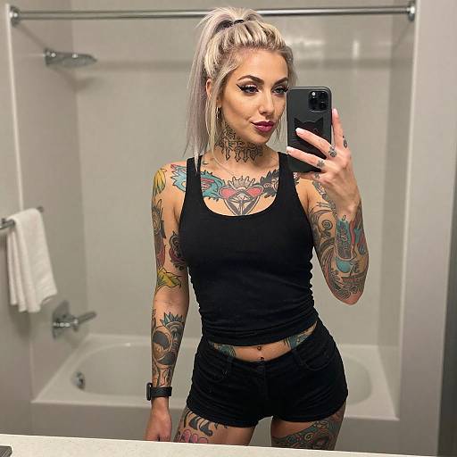 Tattooed Woman Mirror Selfie