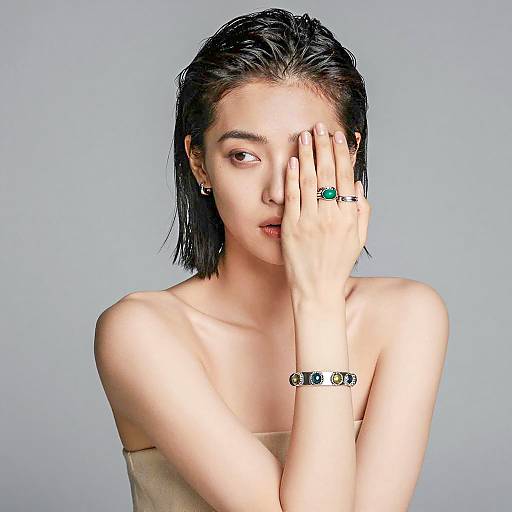 Woman with Jewelry Covering Face