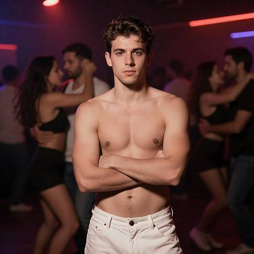 Intense Shirtless Man in Nightclub Scene