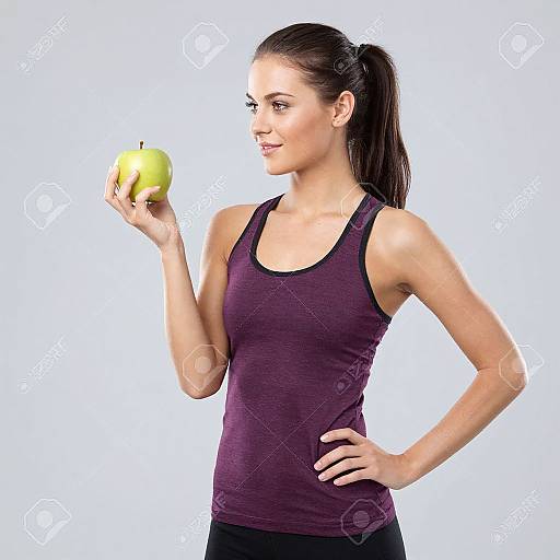 Athletic Woman Holding Apple