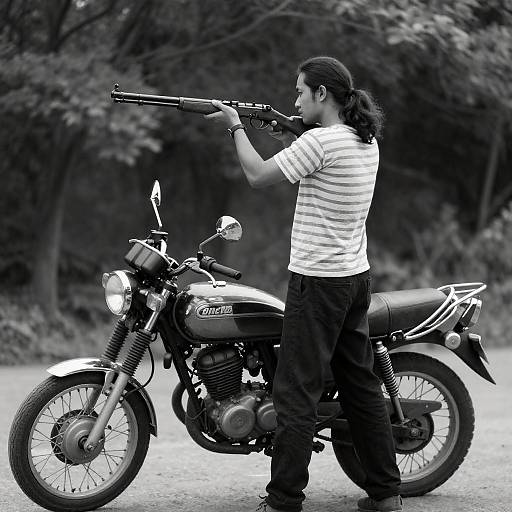 Monochrome Man Aiming Rifle Beside Motorcycle