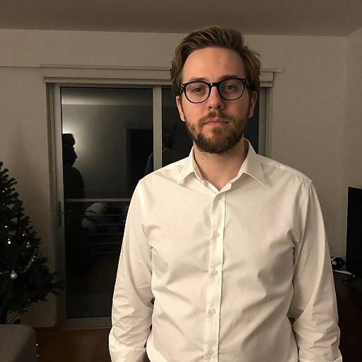 Man in Dim Light with Christmas Tree