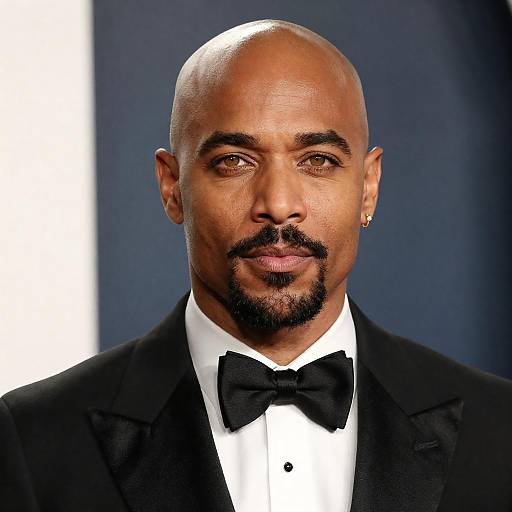 Bald Man in Tuxedo with Yellow Eyes