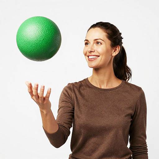 Smiling Woman with Hovering Green Ball