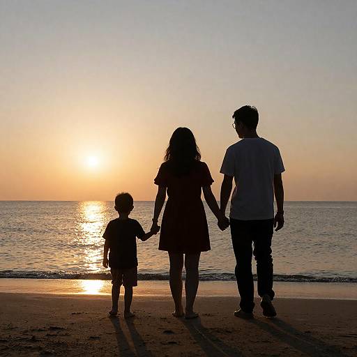 Family Silhouette at Sunset Beach
