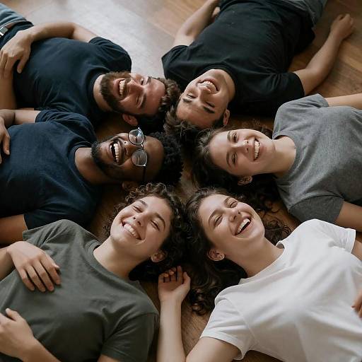 Diverse Friends Sharing Laughter on Floor