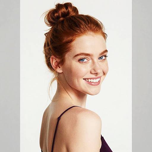 Smiling Redhead Woman with Blue Eyes