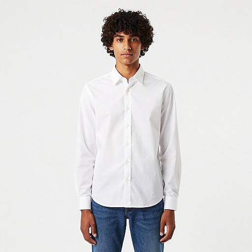 Young Man in White Shirt and Blue Jeans