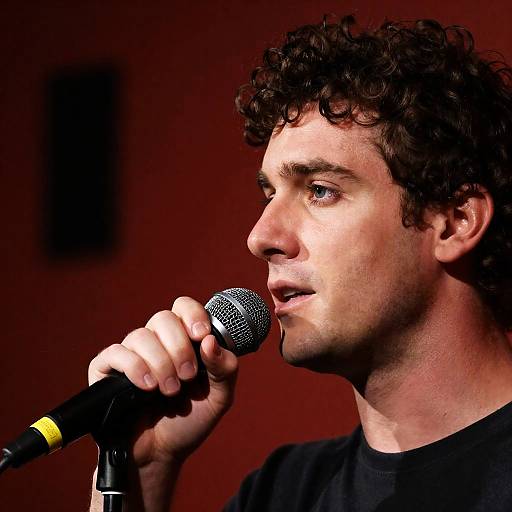 Intense Profile of a Man with Microphone