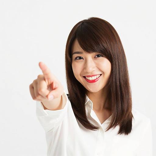 Smiling Woman Pointing Forward