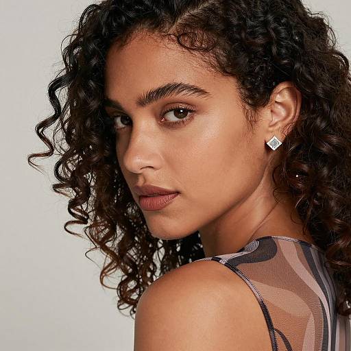 Elegant Woman with Curly Hair and Style