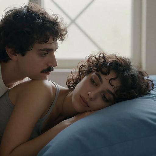 Tender Couple by Crisscross Window Light