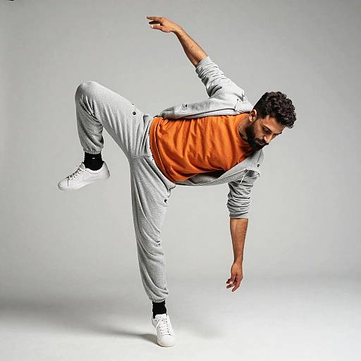 Man Performing Dance Trick in Casual Outfit