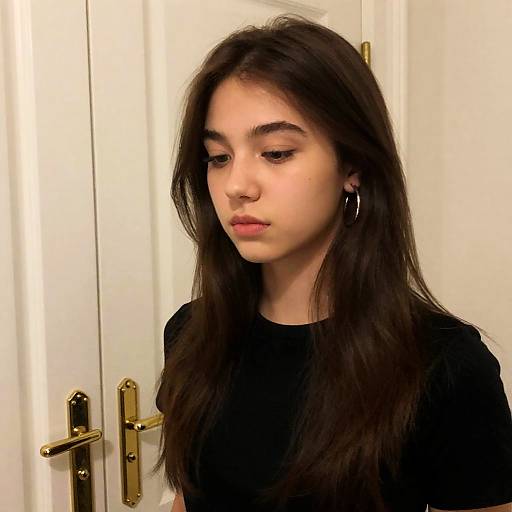 Young Woman in Dimly Lit Room