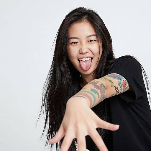 Playful Young Asian Woman with Tattoos