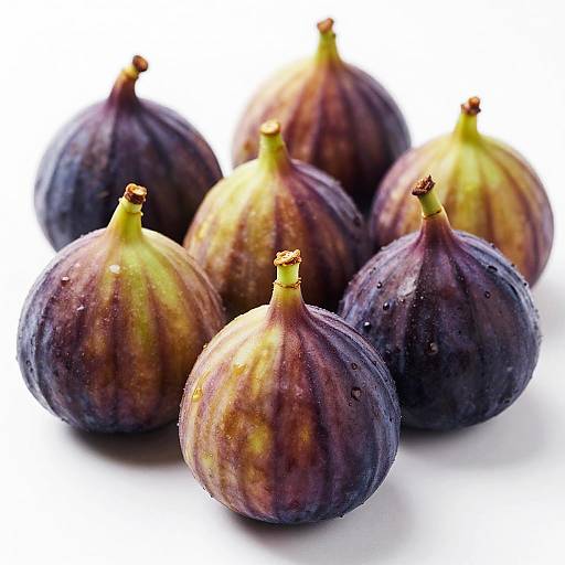 Ripe Purple Figs on White Background