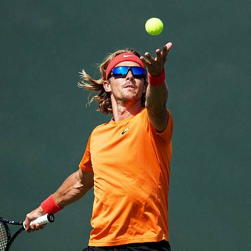 Male Tennis Player Mid-Serve