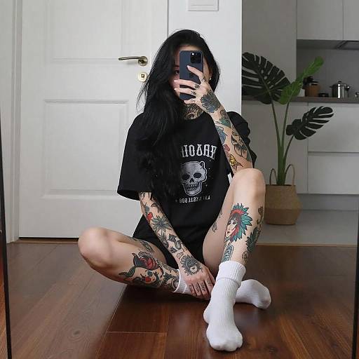 Tattooed Woman Mirror Selfie