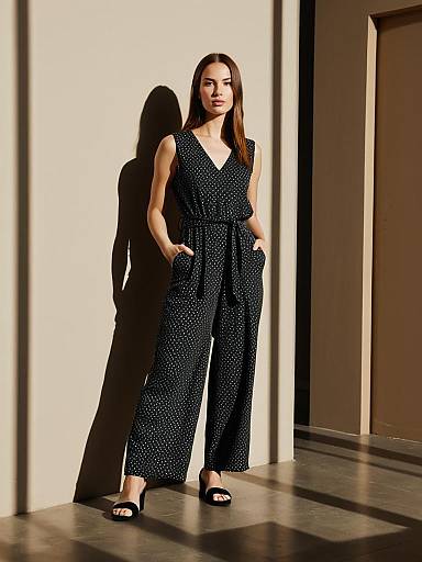 Woman in Polka Dot Wide-Leg Jumpsuit